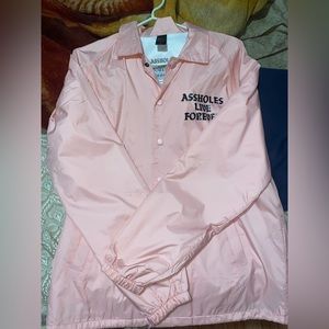 Assholes live forever rain jacket ladies